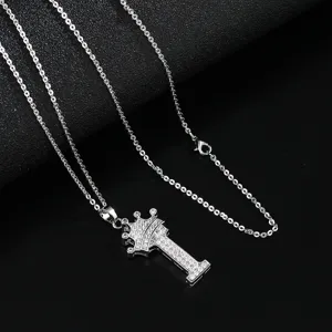 Stunning crown initial letter necklace with sparkling cubic zirconia, elegant jewelry gift.