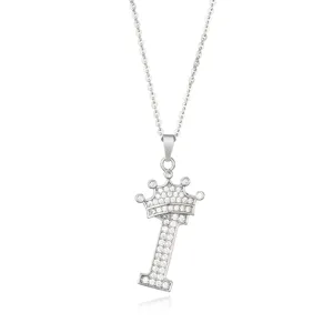 Close-up of the delicate silver letter I pendant with sparkling crystal crown, fine chain detail.