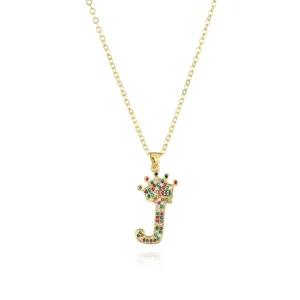 Close-up view of the dazzling multicolored crystal crown letter J pendant necklace details.