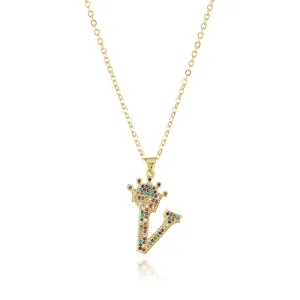 Detailed view of gold-plated letter V crown pendant necklace adorned with colorful sparkling stones.