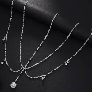 Detailed view of silver crystal forehead chain, rhinestone tassel hair jewelry for boho style.