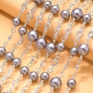 Grey pearl and crystal metal chain accessory, detailed view for fashion jewelry crafting.