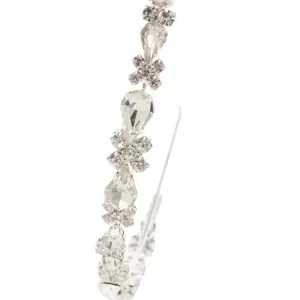 Close-up detail of sparkling rhinestone hairband, elegant crystal headwear for women.