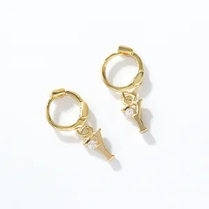 Gold letter Y pendant hoop earrings with sparkling diamond crystal detail for daily wear.