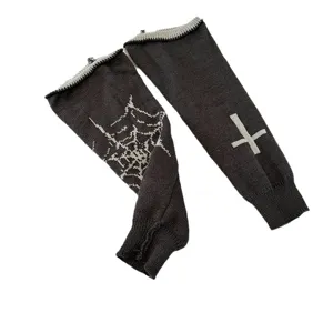 Y2K gothic knit leg warmers for women, black slouch socks with cross and spiderweb pattern.