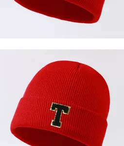 Stylish red knit beanie hat with letter patch, warm winter outdoor casual cap for men and women.