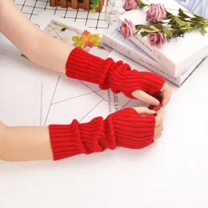 Red knitted arm warmers fingerless gloves for women, stylish autumn sun protection sleeves.