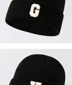 Black knit beanie hat with letter patch, warm winter streetwear casual cap for men and women.