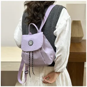 Sac à dos décontracté en nylon mauve pour femmes, cartable de voyage coréen avec cordon de serrage.