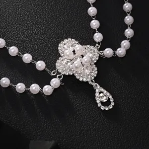Pearl multi-layer hair chain detailed view showcasing sparkling rhinestones and elegant design.