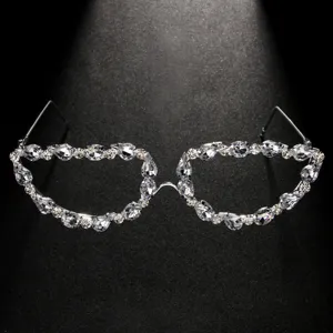 Closeup details of the sparkly rhinestone decorative glasses frame, perfect party accessory.