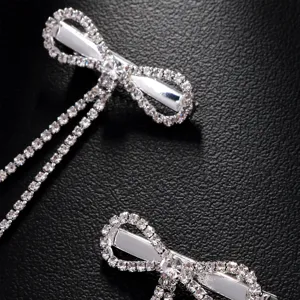 Silver rhinestone bow hair clips with dazzling crystal tassel chains for sweet girls.