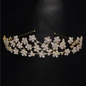 Exquisite gold rhinestone floral headband, elegant bridal hair accessory for weddings.