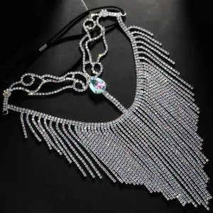 Rhinestone tassel face mask detail showing sparkling crystals and colorful gemstone pendant.