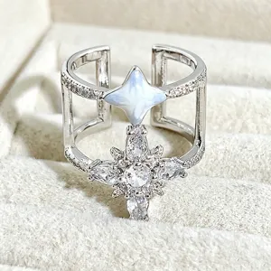 Silver double layer star ring with sparkling cubic zirconia and blue enamel detail.