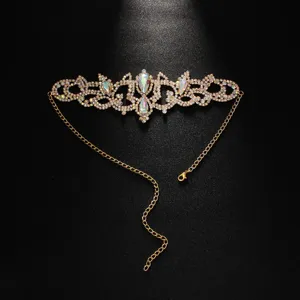 Close-up detail shot of the luxurious bohemian rhinestone thigh chain, sparkling crystal accents.