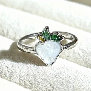 Sweet girl style enamel fruit open ring with cute green leaves and white strawberry design.