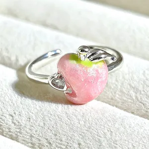 Sweet girl style pink glitter apple ring with sparkling crystal heart and silver adjustable band.