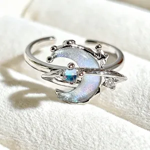Sweet celestial open ring with a shimmering crescent moon and Saturn design and nice enamel.