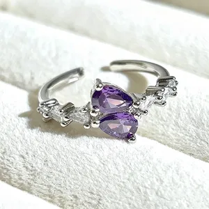Exquisite detail view of the double purple pear cubic zirconia adjustable silver ring.