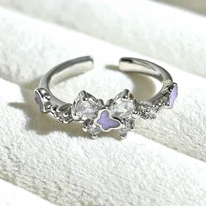 Detailed close-up of a sweet butterfly enamel open ring, featuring sparkling cubic zirconia stones.