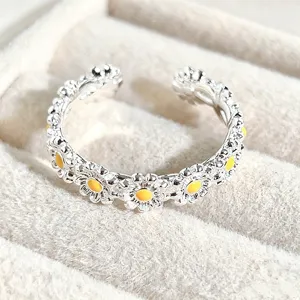 Sweet silver open ring featuring yellow enamel daisy flowers for women and girls daily wear