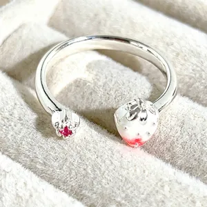 Sweet enamel strawberry open ring for women, stylish cute silver metal fruit jewelry detail.