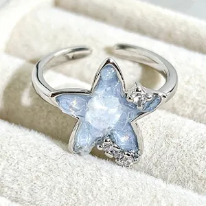 Sweet open star ring with light blue glitter and rhinestones for cute daily wear.