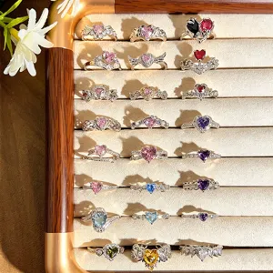 Exquisite multi-color heart zircon open ring detail showing various dopamine stackable styles.