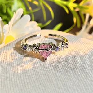 Exquisite dopamine pink heart zircon open ring with pearls and sparkling side stones.