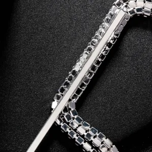 Rhinestone hair clip detail close-up showcasing sparkling crystals and metallic silver structure.