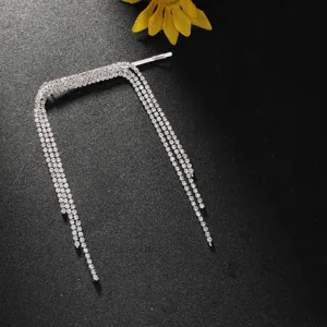 Rhinestone tassel hair clip detail shot, sparkling crystal fringe bobby pin for elegant hairstyles.