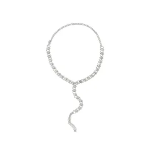 Detailed close-up view of a sparkling rhinestone toe foot chain, summer beach jewelry.