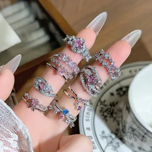 Stunning silver-plated multi-stone zircon stackable rings set featuring pink and blue gems.