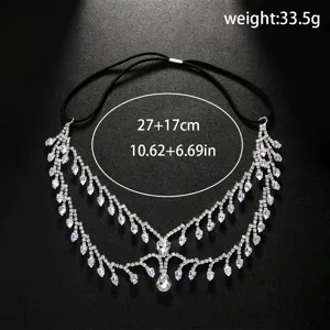 Rhinestone tassel mask detail, sparkly crystal face chain jewelry, party accessory.