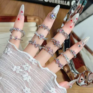 Stackable silver open rings set with cute pink zircon bows and heart crystal designs for women.