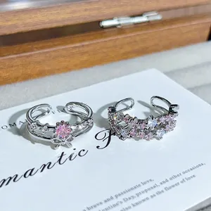 Exquisite pink cubic zirconia open rings stackable fashion jewelry detailed closeup product view.