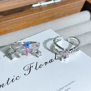 Exquisite zircon open ring detail with cute bow and branch design, premium stackable jewelry.