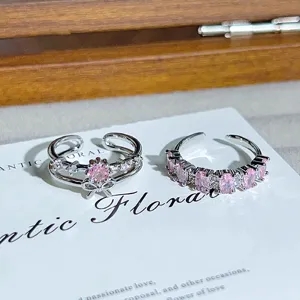Silver open rings with pink cubic zirconia, elegant stackable design for women and girls.