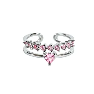 Pink cubic zirconia double layer open ring detail close up shot showing sparkling stones.