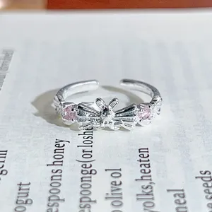 Silver open ring with bow and pink cubic zirconia, sweet and cool style for girls jewelry.