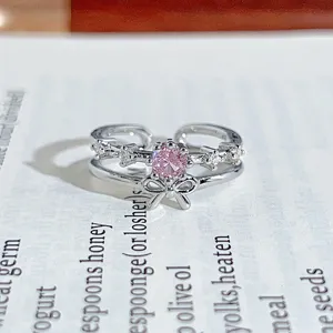 Silver double-layer open ring featuring a sparkling pink zircon and cute bow design for sweet styles.
