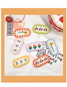 Set of cute wool crochet floral and fruit hair clips, candy colors for autumn and winter style.