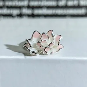 Detailed macro shot of the pink white enamel flower open ring, showing delicate floral craftsmanship.