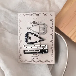 Y2K style hair clip set featuring heart and rectangle BB clips with polka dot design.