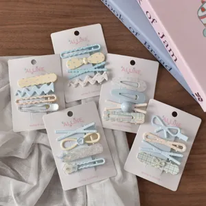 Set of 5 pastel blue floral hair clips and BB hairpins for cute sweet daily styling.
