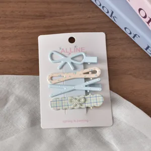 Detail shot of sweet dopamine style hair clip set with cute bows and floral prints.