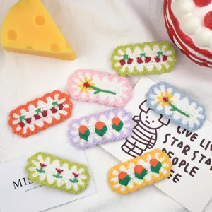 Cute handmade crochet hair clips set, colorful floral and cherry design for kids and women.