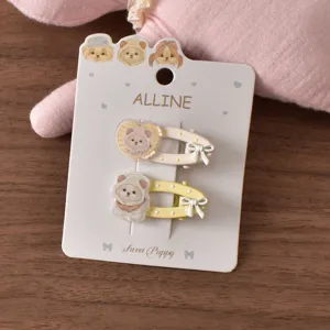 Cute puppy acrylic hair clip detail shot, featuring sweet bows and a lovely cartoon dog design.