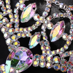 Exquisite rhinestone mask detail close-up, sparkling crystal gems for party, European style.